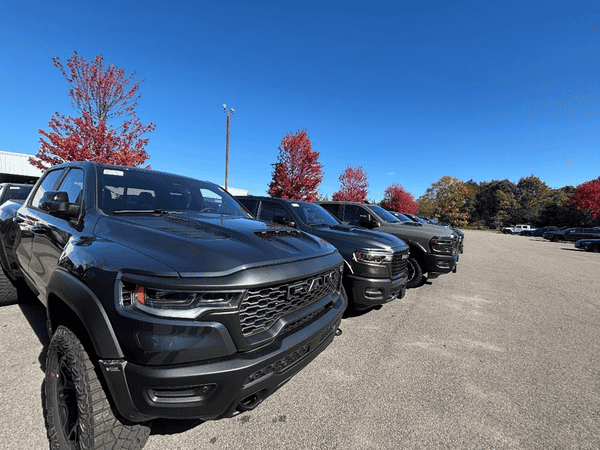 Some of Planet's Ram's large inventory is shown in a line on a sunny Fall day.