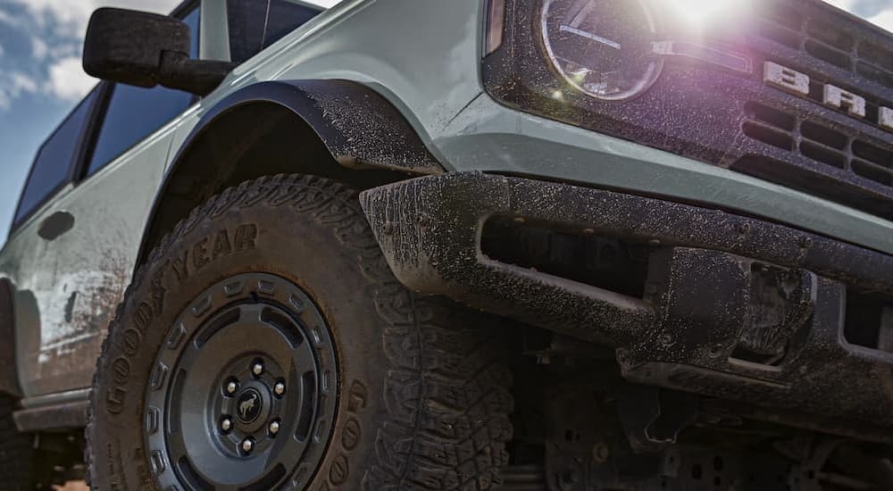 Close-up of the wheel on a green 2025 Ford Bronco.