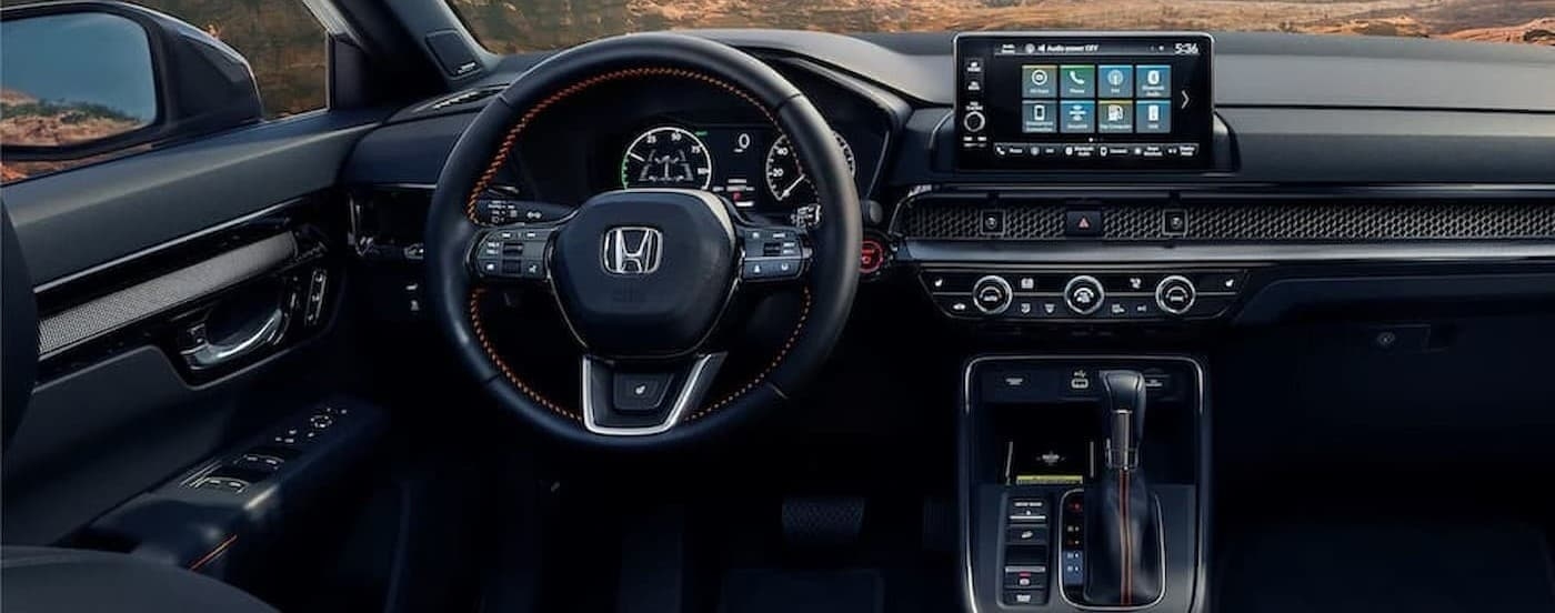 The black dash in a 2024 Honda CR-V for sale in Hillside.