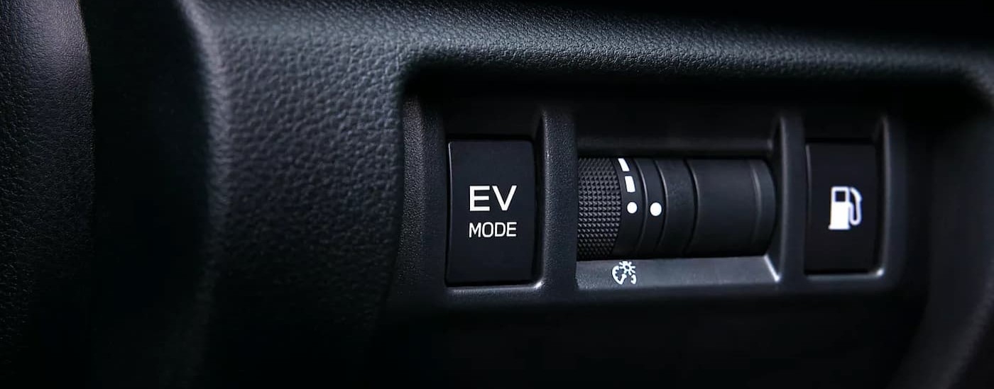 The EV Mode switch in a 2026 Subaru Crosstrek.