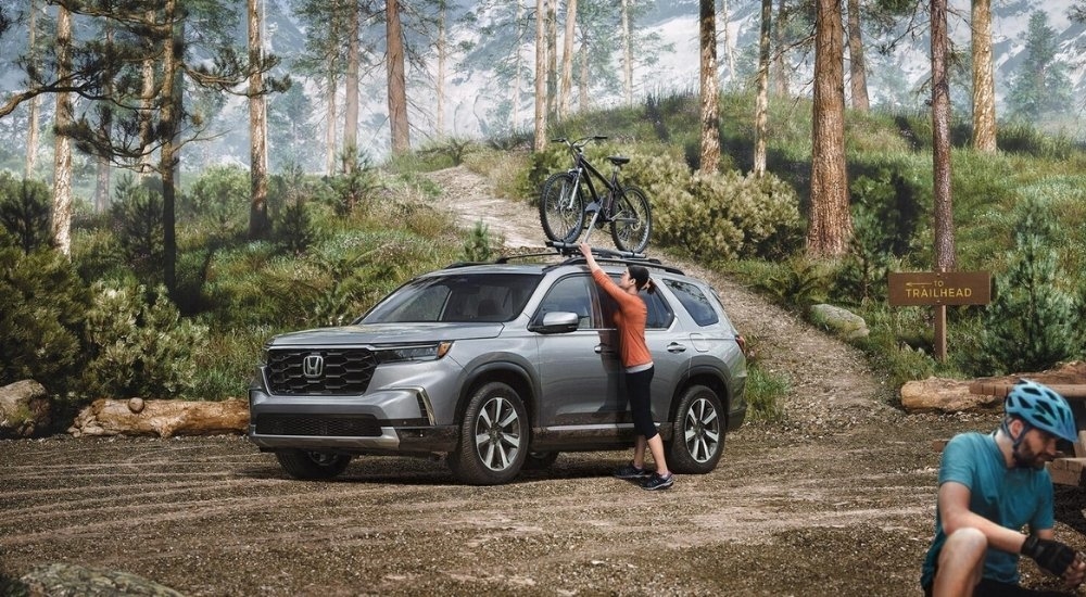 A silver 2025 Honda Pilot for sale near Marysville from the side.
