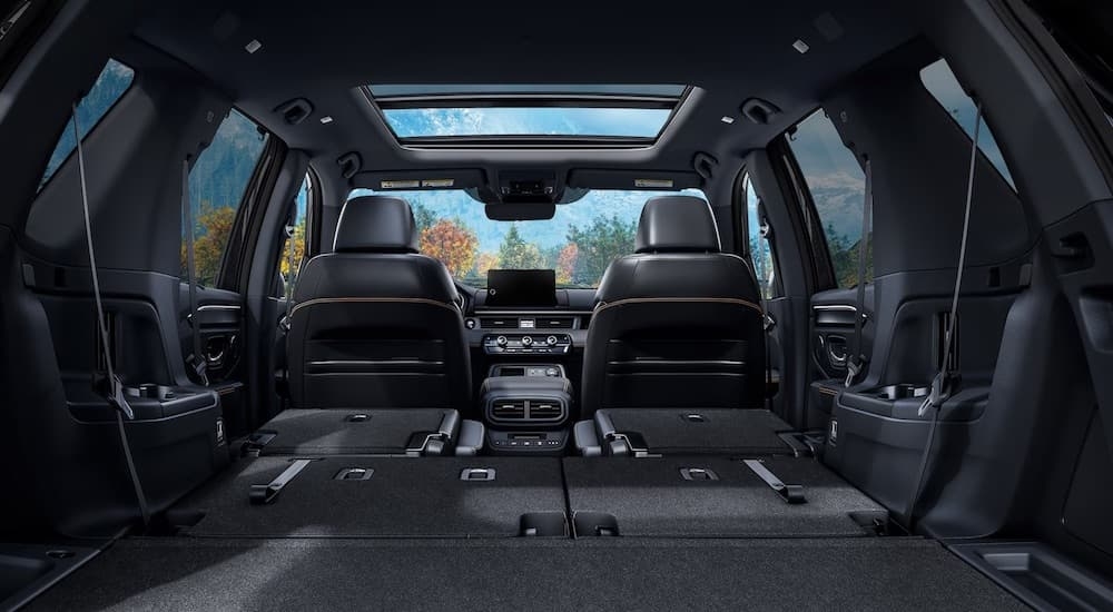 The black interior of a 2025 Honda Pilot from the rear.