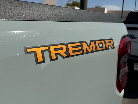tremor package emblem on a 2025 Ford Maverick truck parked at the Chalmers Ford dealership in Albuquerque, NM