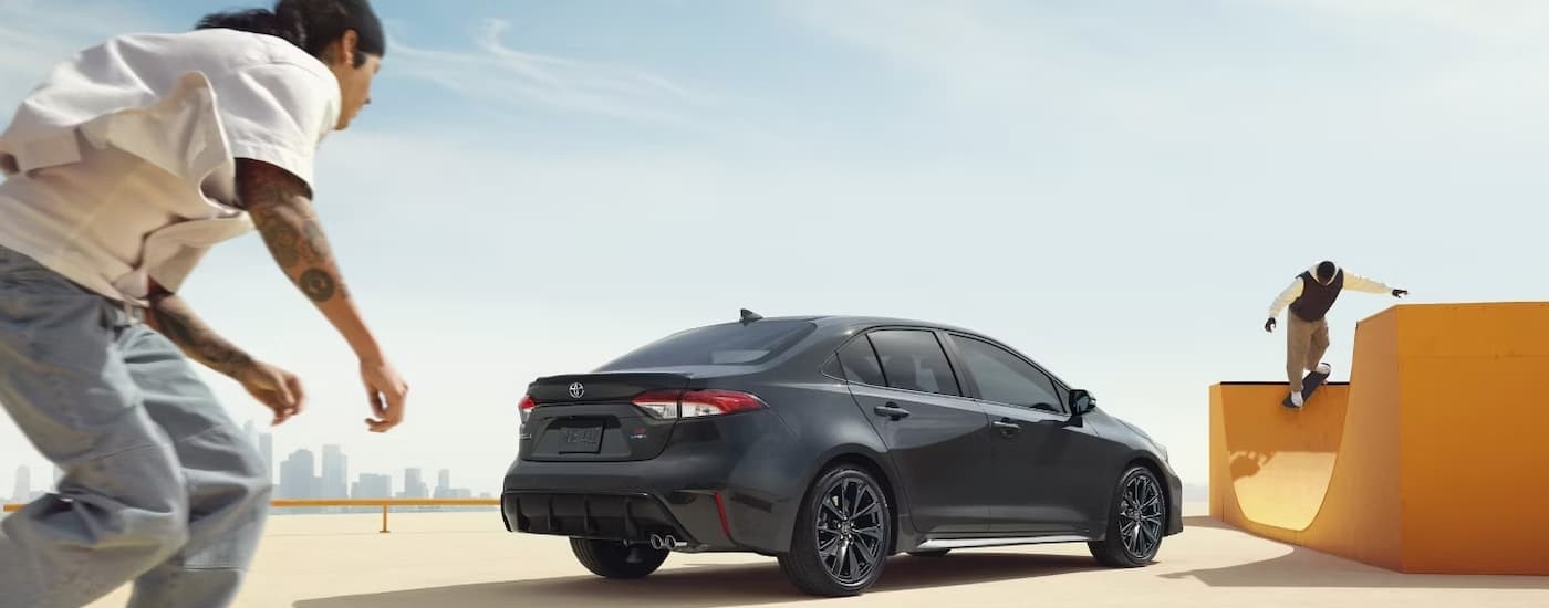 A gray 2026 Toyota Corolla parked at a skatepark.