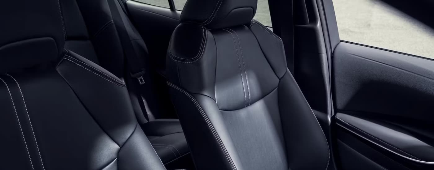 The black interior in a 2026 Toyota Corolla for sale near Greenfield.