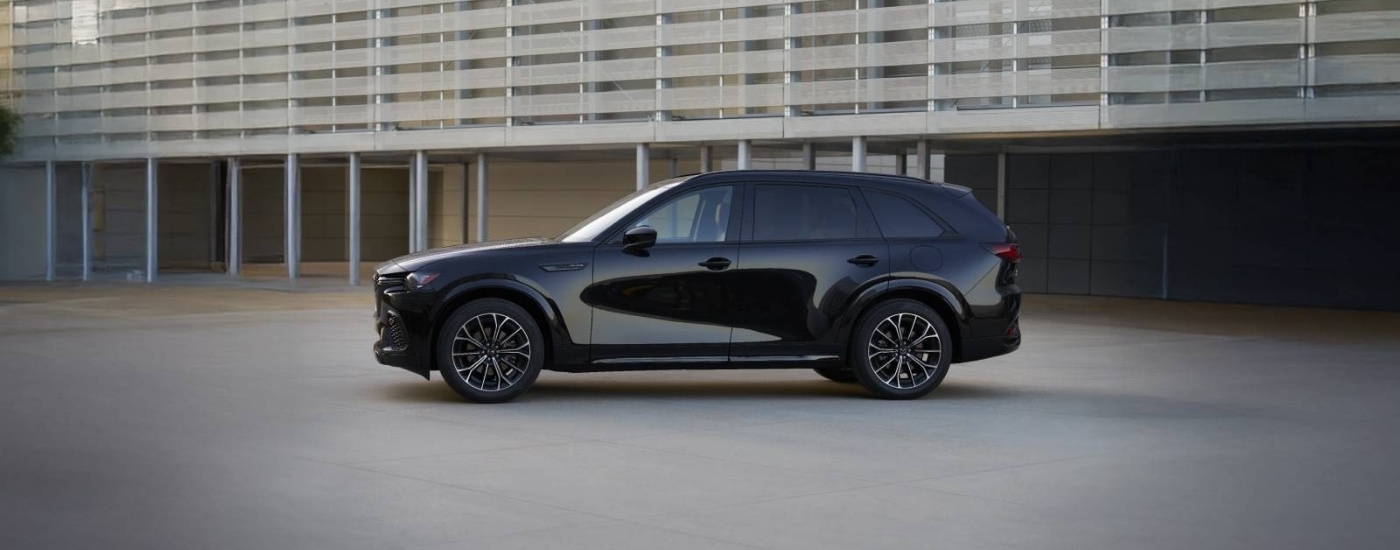 Black 2025 Mazda CX-70 parked at a Mazda dealer near North Miami