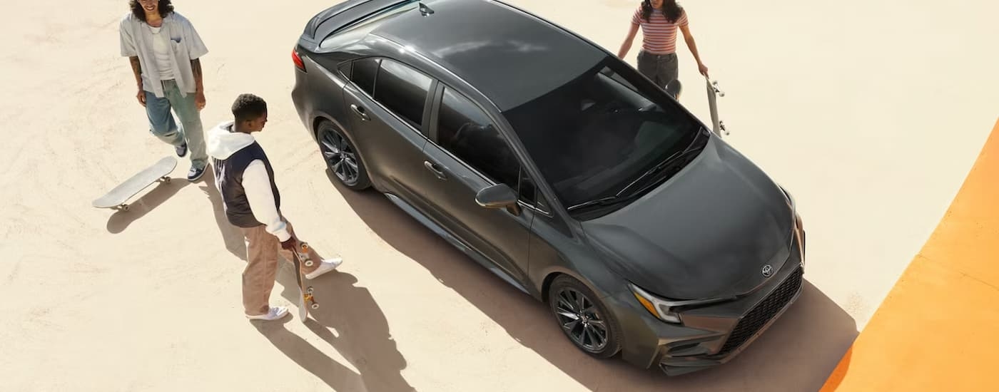 Grey 2026 Toyota Corolla parked at a skate park