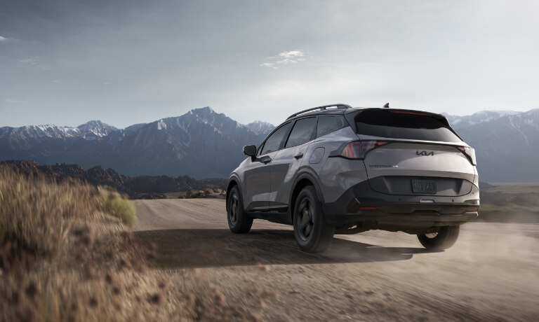 2026 Kia Sportage driving in desert