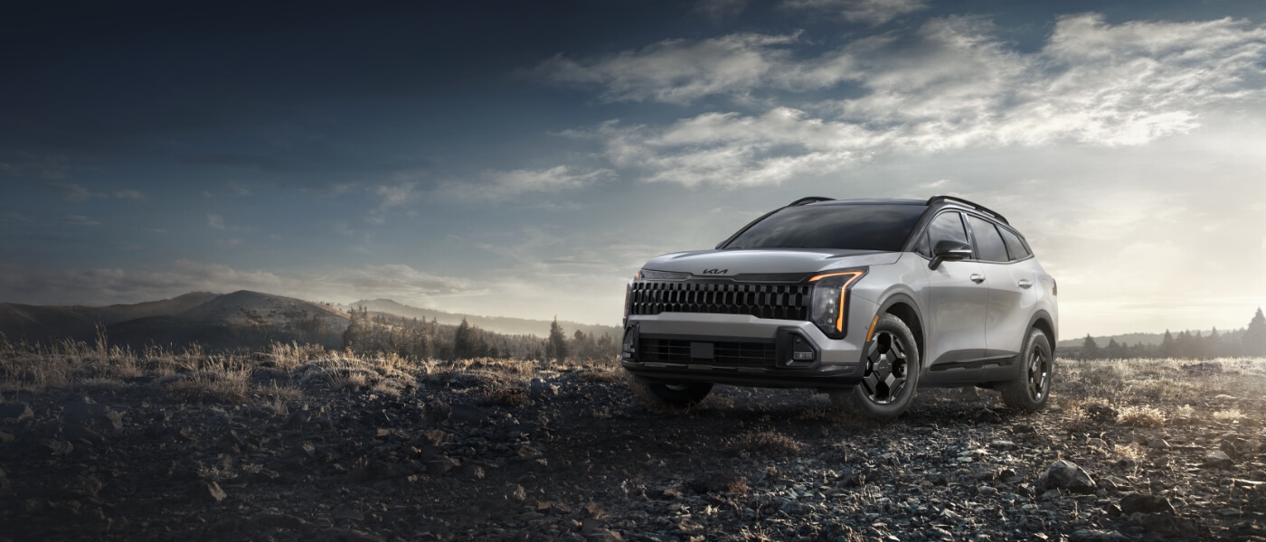 2026 Kia Sportage parked on rocks