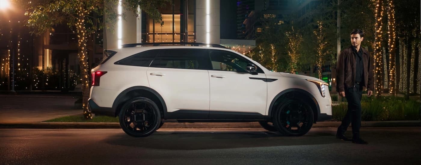 Side view of a white and black 2025 Kia Sorento for sale near Porter