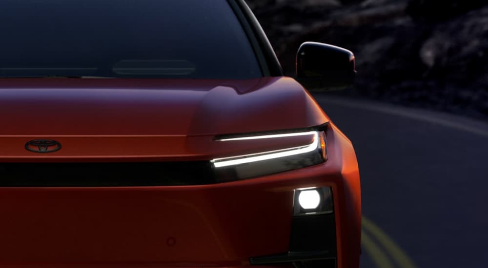 Headlight on an orange 2026 Toyota CH-R 