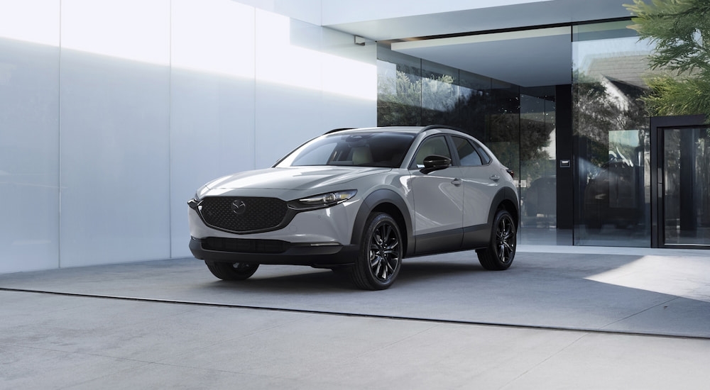 White 2026 Mazda CX-30 parked on a driveway.