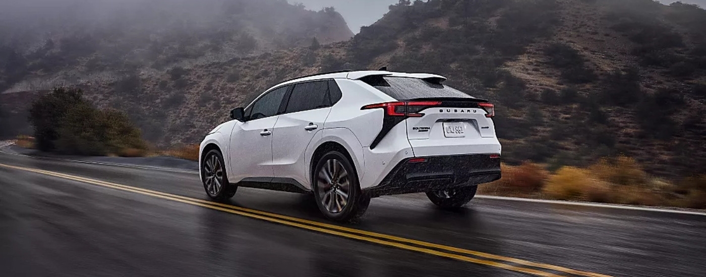 A white 2026 Subaru Solterra from the rear at an angle.