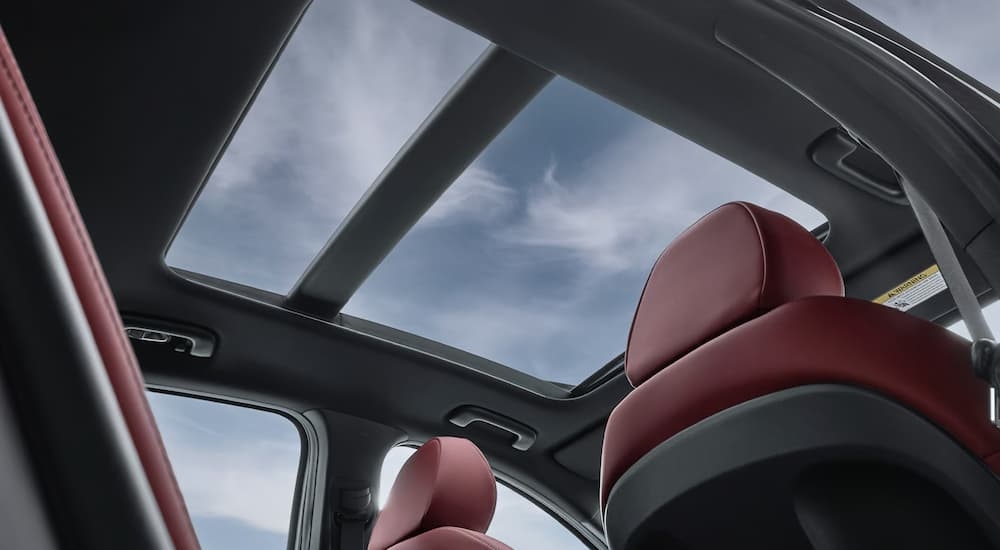 Red leather interior and sunroof in a 2026 Kia K5