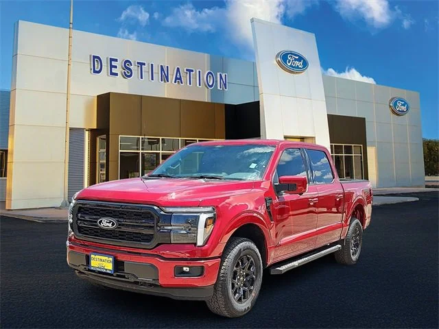 Destination Ford of Dumas Dealership with New Red Ford F-150 in Front Near Stratford, TX