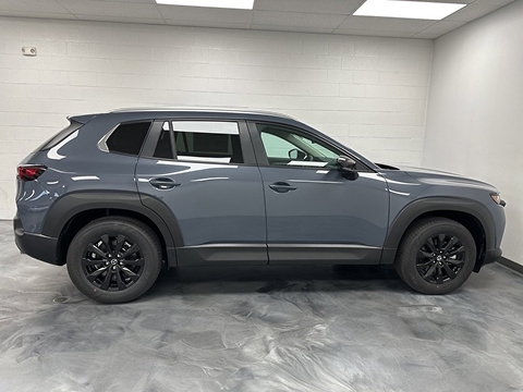 grey 2026 Mazda CX-50 SUV parked at the Bountiful Mazda dealership in Bountiful, UT