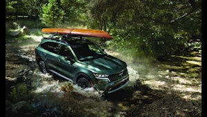 2026 Kia Sorento Exterior Driving Through Stream With Kayak
