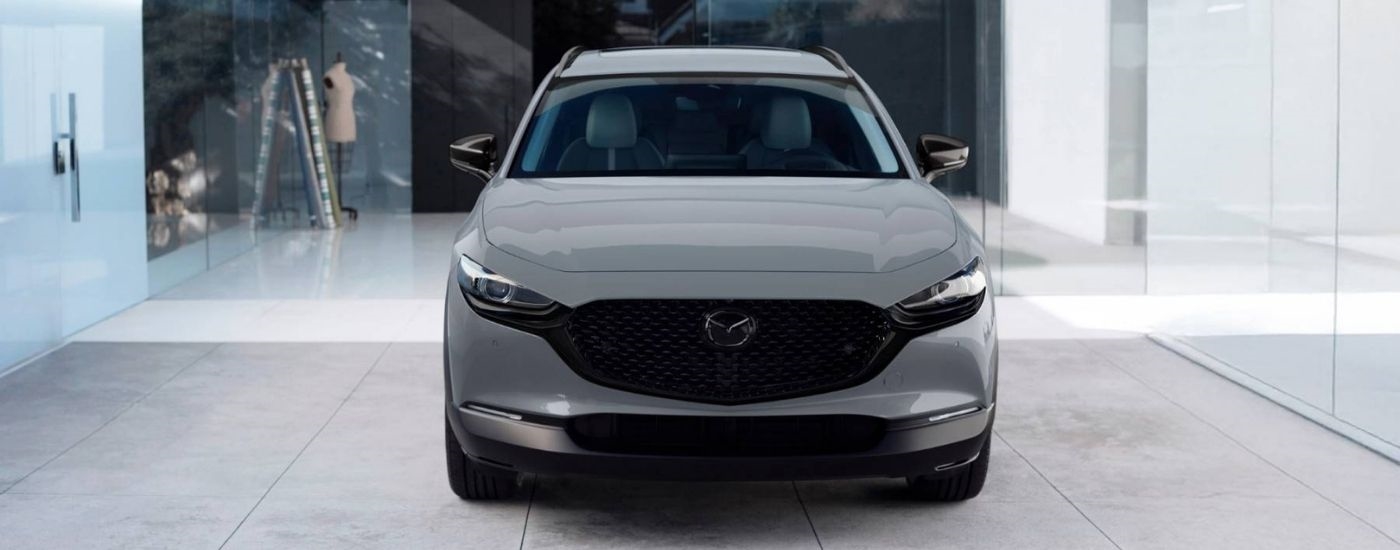 A grey 2026 Mazda CX-30 for sale near Coral Terrace parked in a lobby