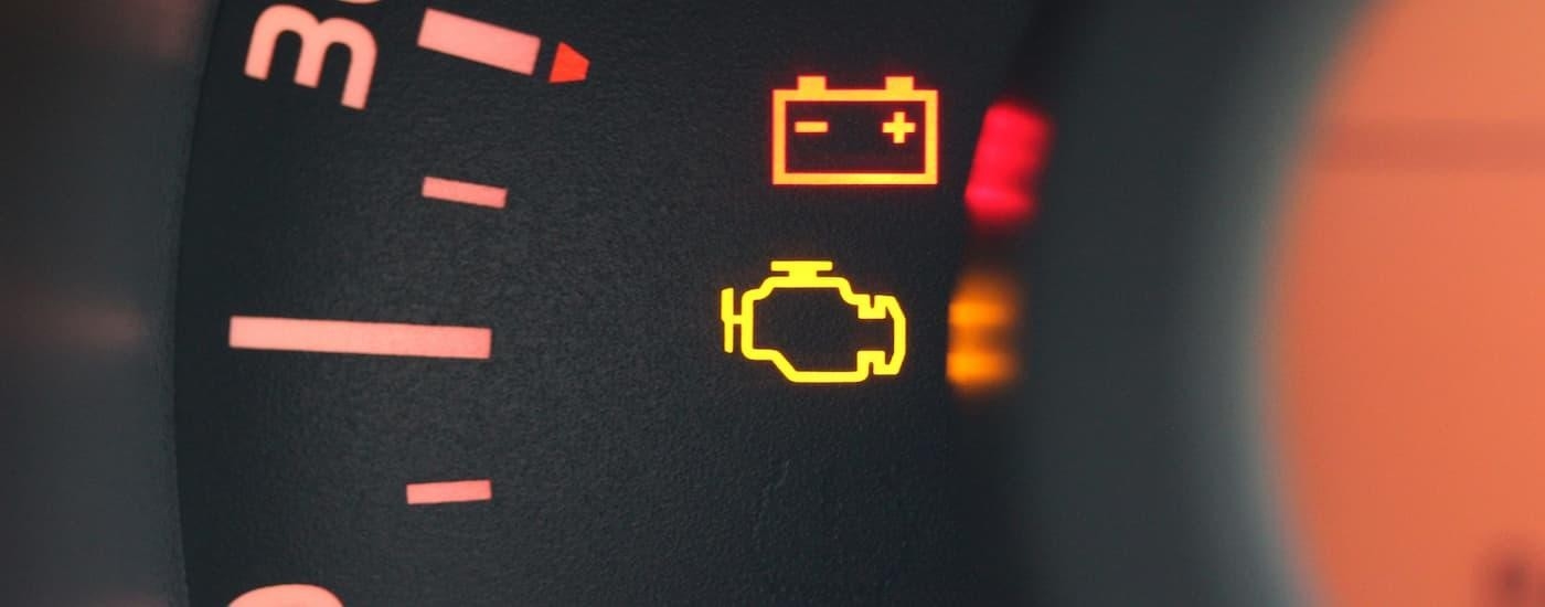 Battery and check engine light on a vehicle