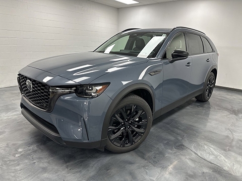 blue 2026 Mazda CX-90 SUV parked at the Bountiful Mazda dealership in Bountiful, UT