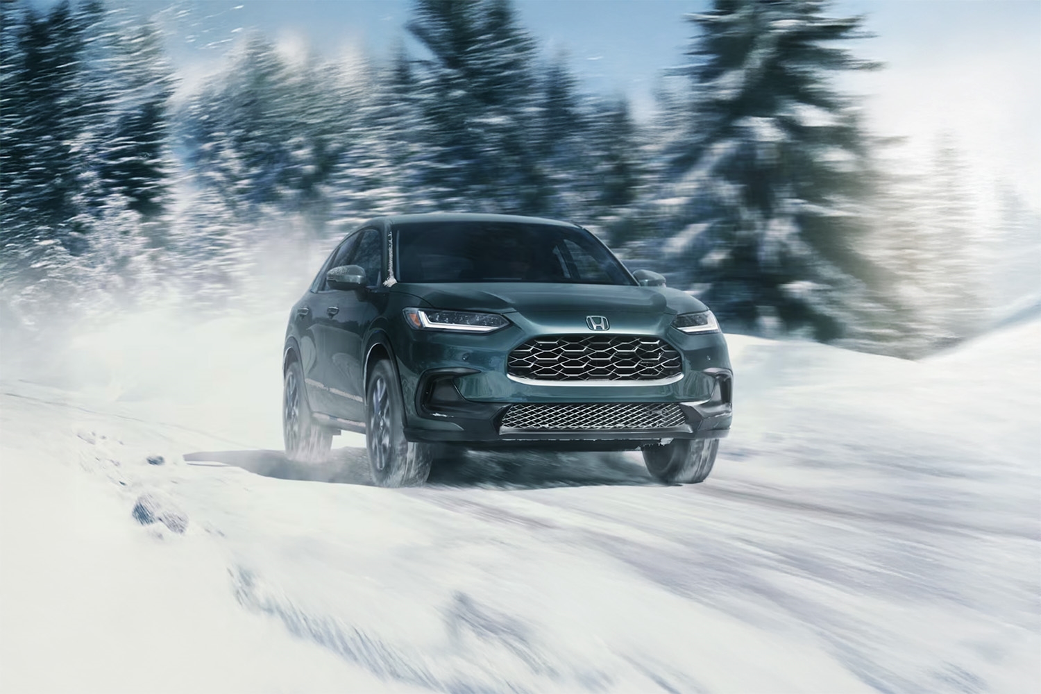 2026 Honda HR-V driving through a snowy landscape