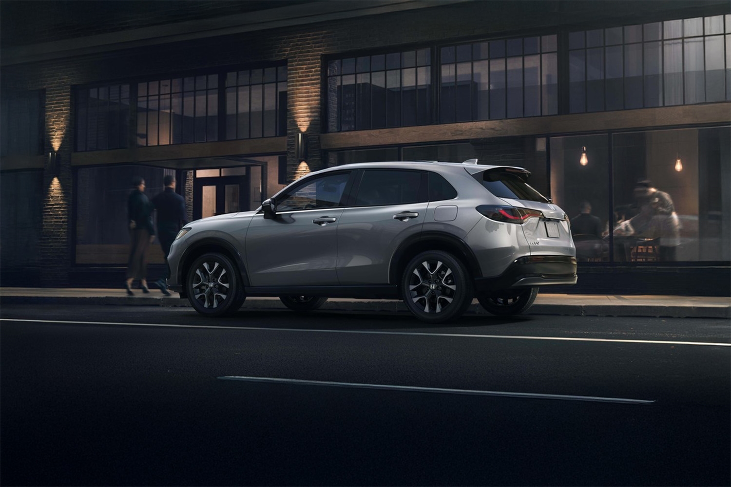 2026 Honda HR-V park in front of a restaurant at night