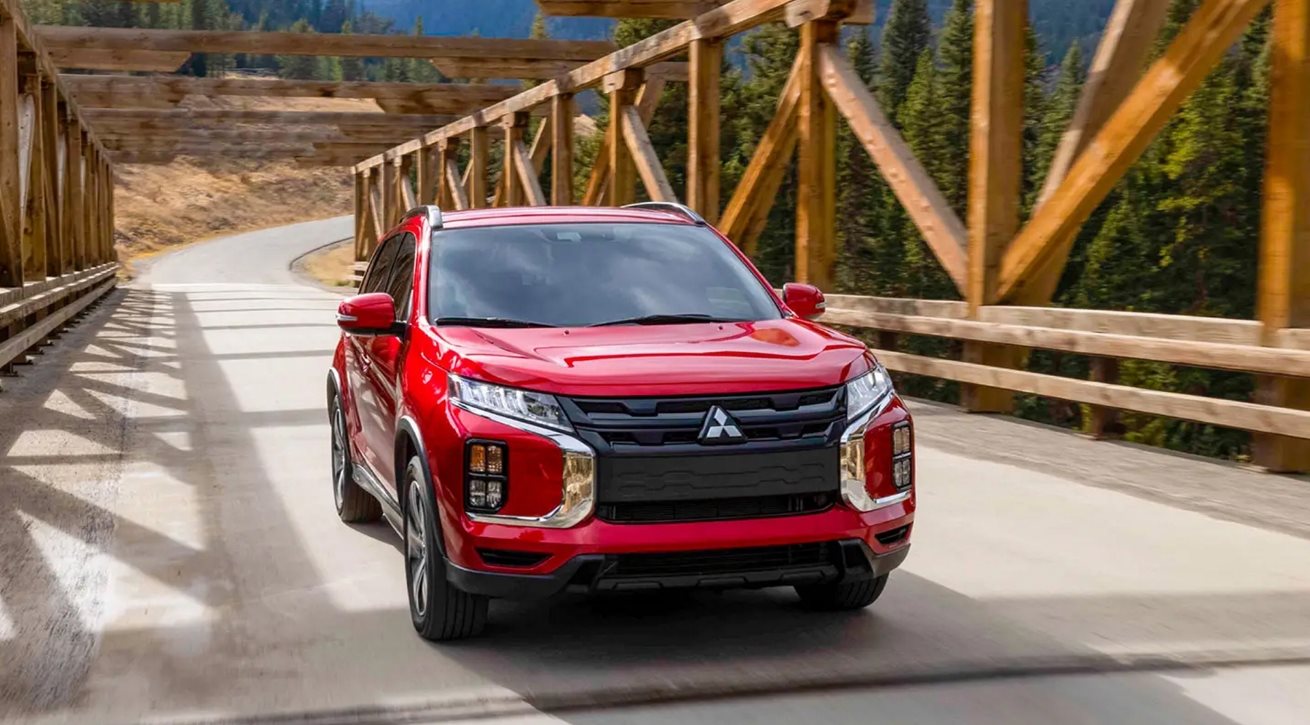 Mitsubishi Outlander Sport driving over bridge