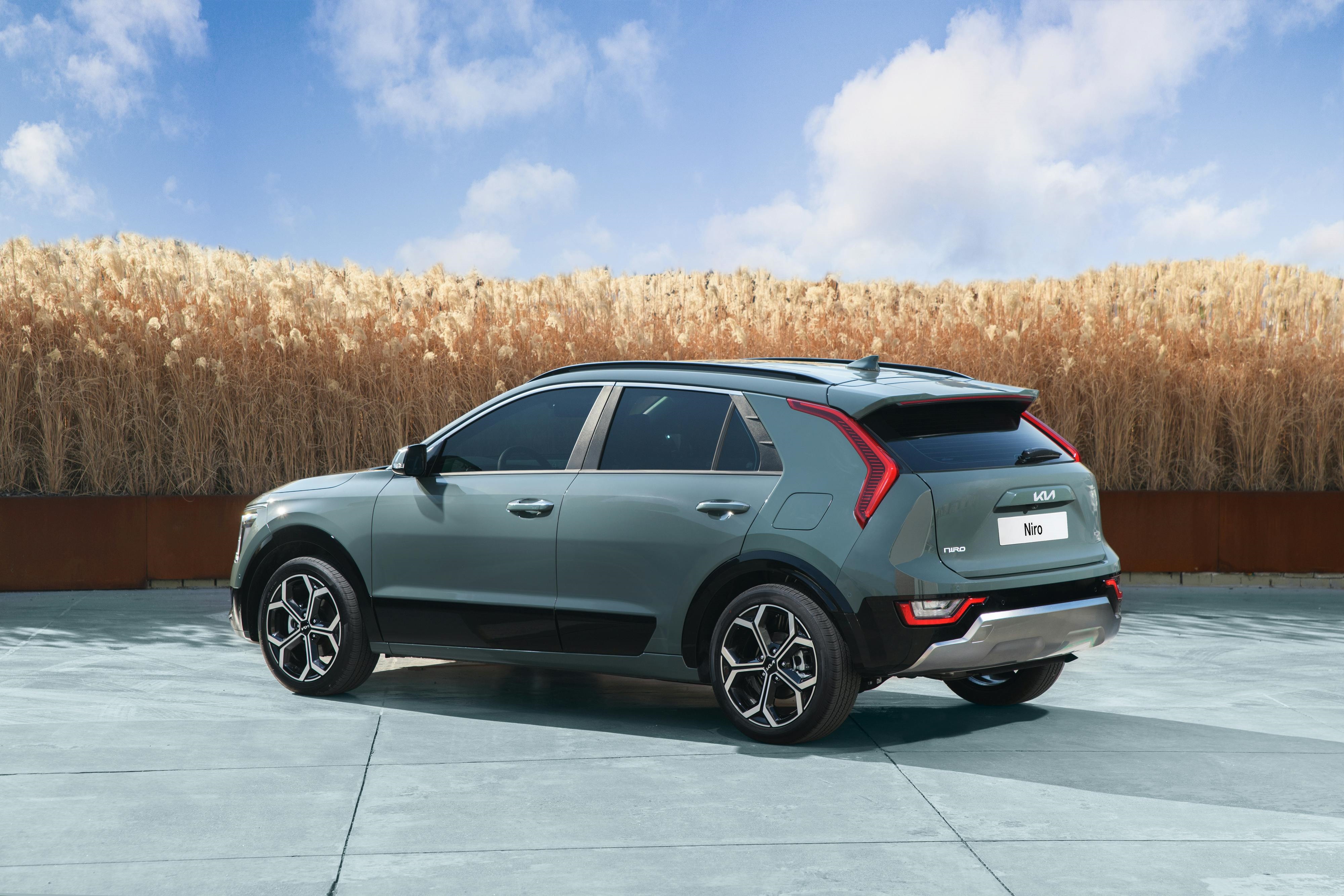 Rear view of the Kia Niro PHEV against a scenic backdrop