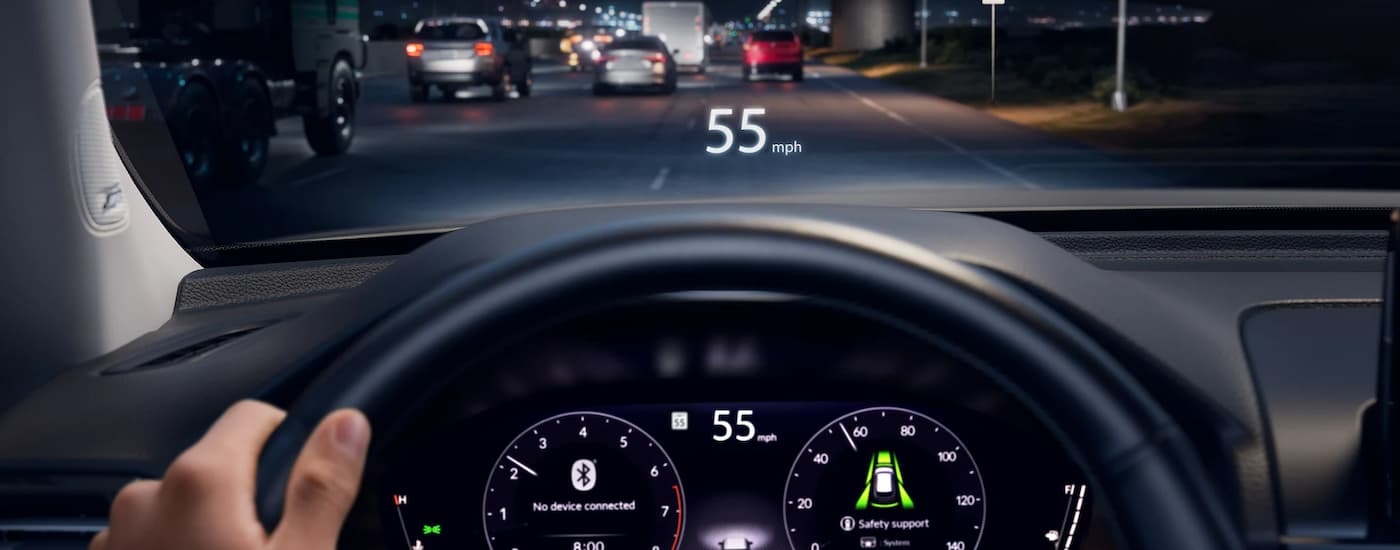 Steering wheel and heads up display in a 2025 Honda Pilot for sale near Kirkland.
