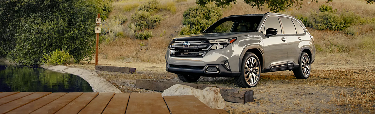 2026 Subaru Forester driving on scenic mountain road