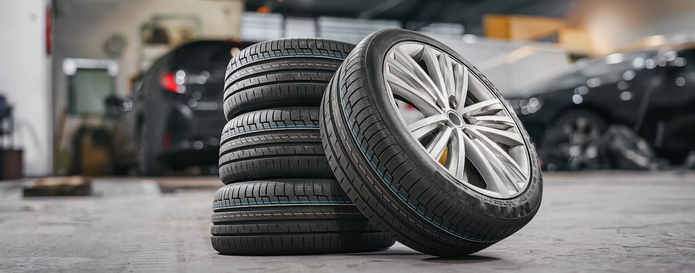 Stack of tires in a garage.