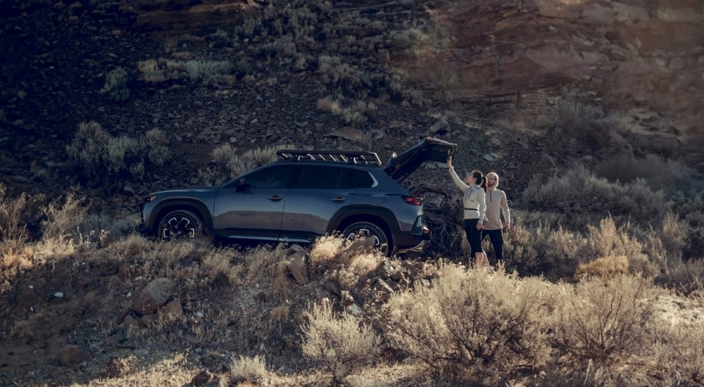 Grey 2026 Mazda CX-50 for sale parked off-road