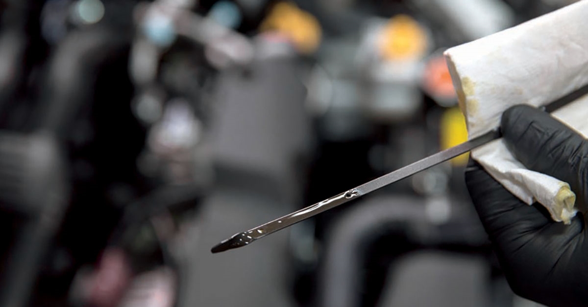 Performing oil change as part of a Subaru service schedule