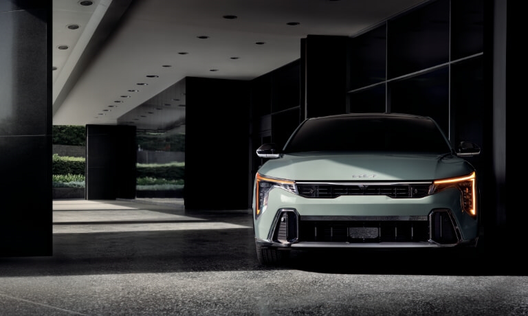 2026 Kia K4 parked head on by building