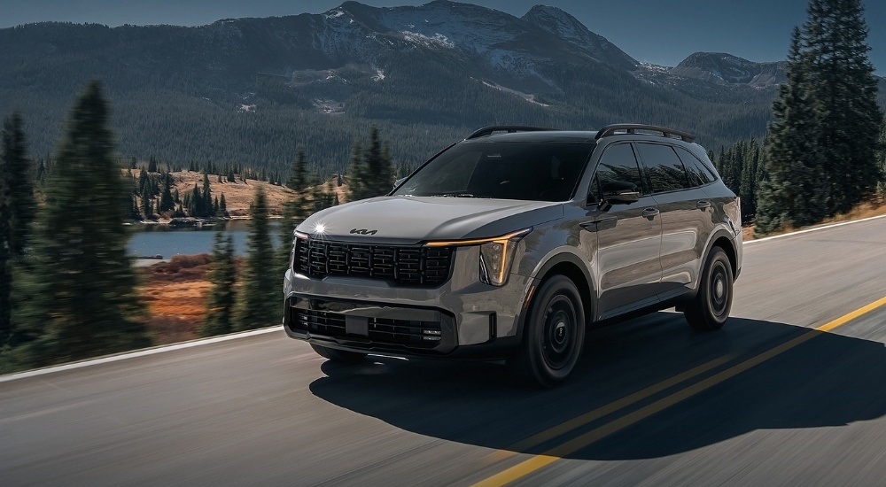 Grey 2026 Kia Sorento driving to a Kia dealer near Atascocita