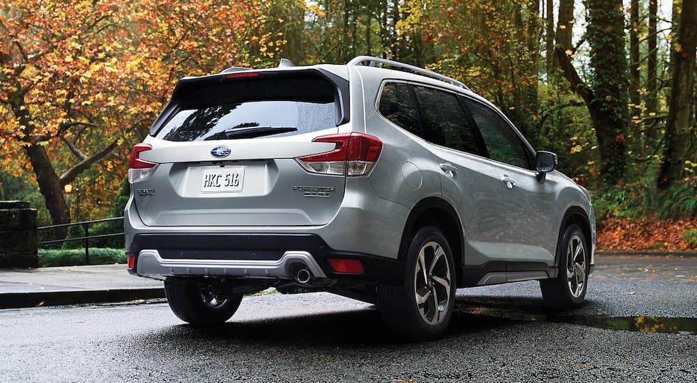 Rear of a silver 2022 Subaru Forester in a parking lot