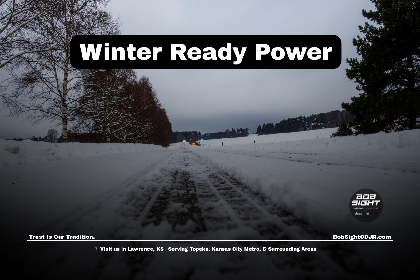 Ram truck driving in snow and icy winter conditions in Lawrence Kansas serving Douglas County drivers