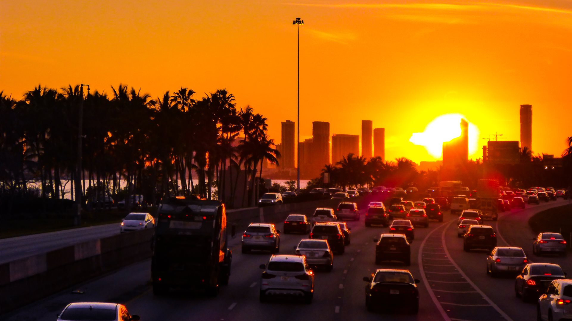 Rush-hour traffic and the Miami skyline at sunset