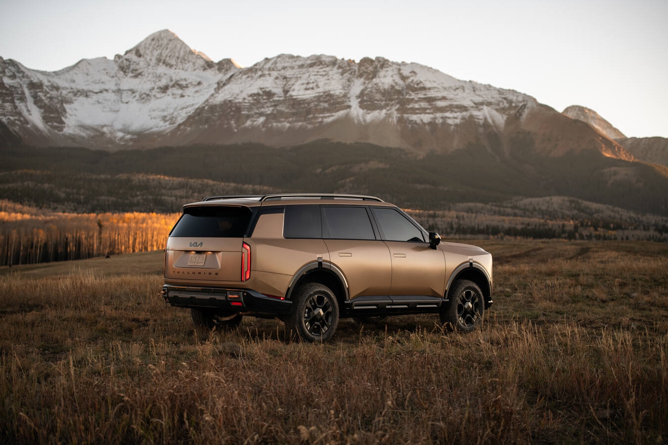 2027 Kia Telluride X-Pro AWD navigating Colorado mountain terrain with 9.1-inch ground clearance