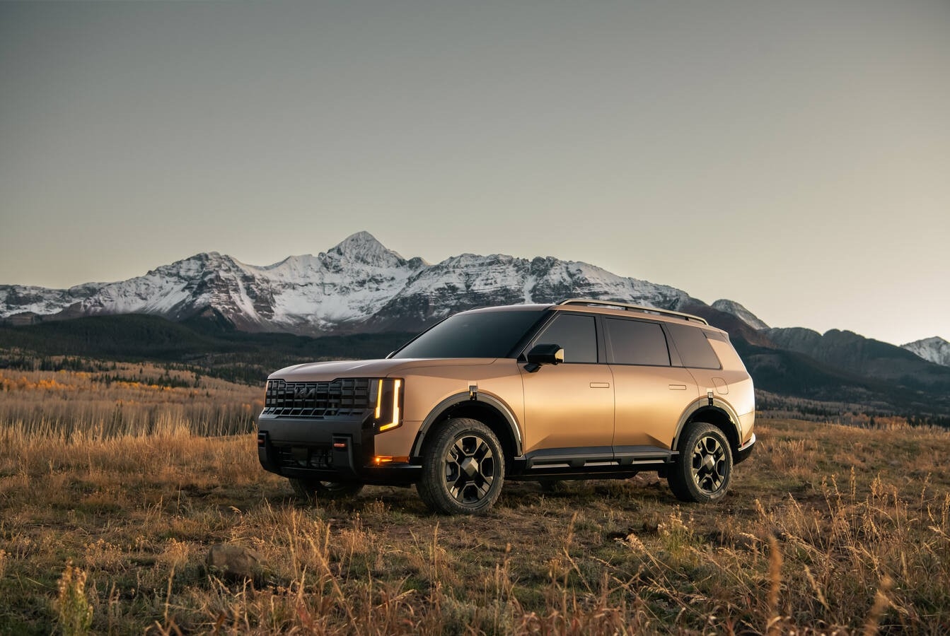 2027 Kia Telluride three-row SUV front exterior view in Colorado mountains near Denver