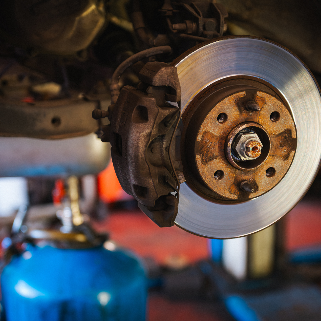 Brake rotor and caliper inspection during vehicle maintenance service