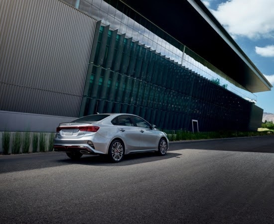 Kia Forte driving in city