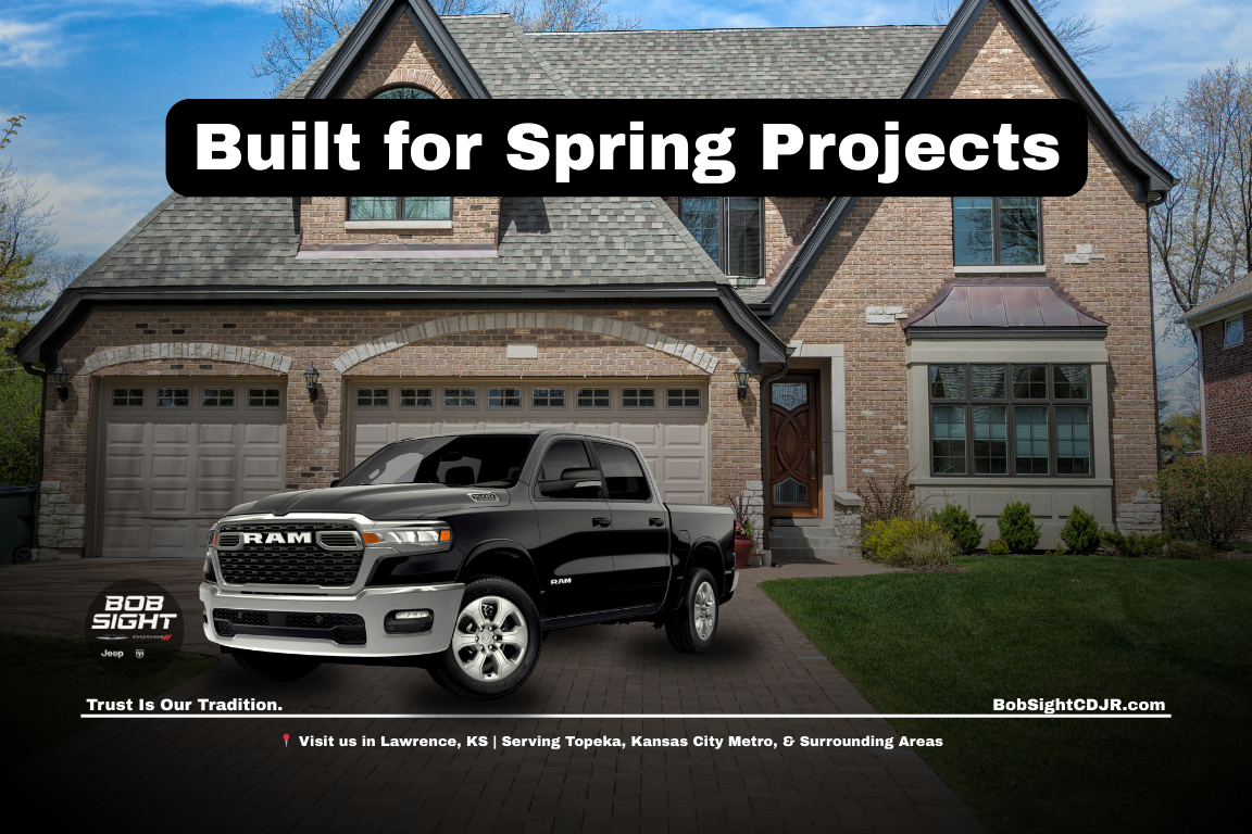 Ram 1500 truck in Lawrence KS hauling landscaping materials for spring home projects at Bob Sight CDJR serving Northeast Kansas