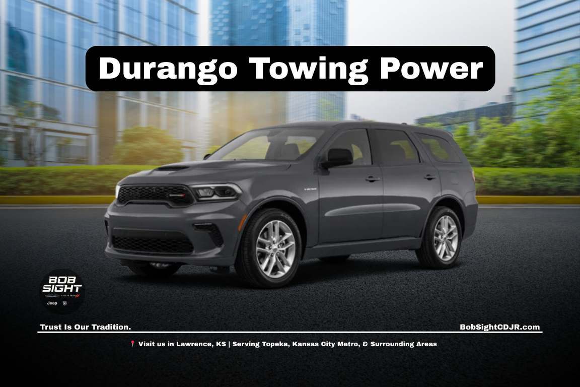 Dodge Durango towing a boat near Lawrence KS showcasing towing capability at Bob Sight CDJR serving Northeast Kansas