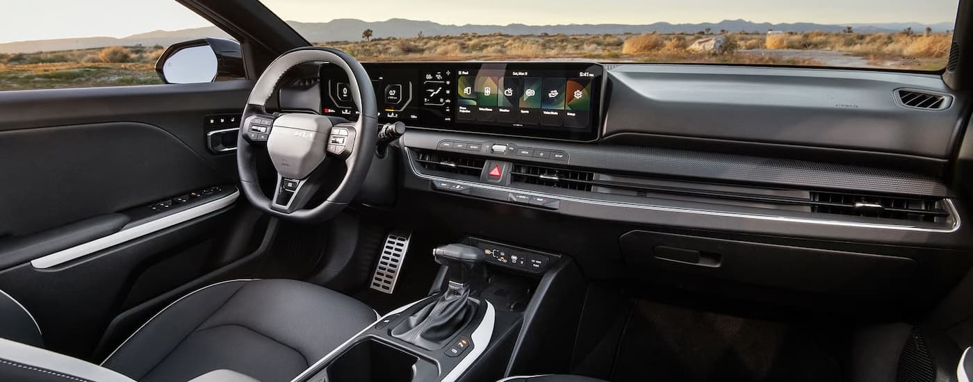 Infotainment display and digital gauge cluster inside a 2026 Kia K4