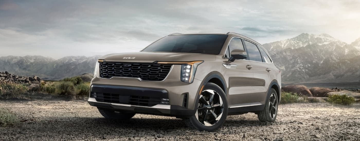 A tan 2025 Kia Sorento parked off-road