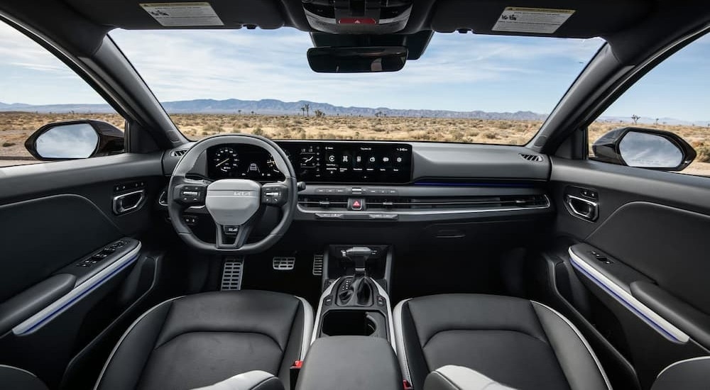 Black interior and dash in a 2026 Kia K4 Hatch.