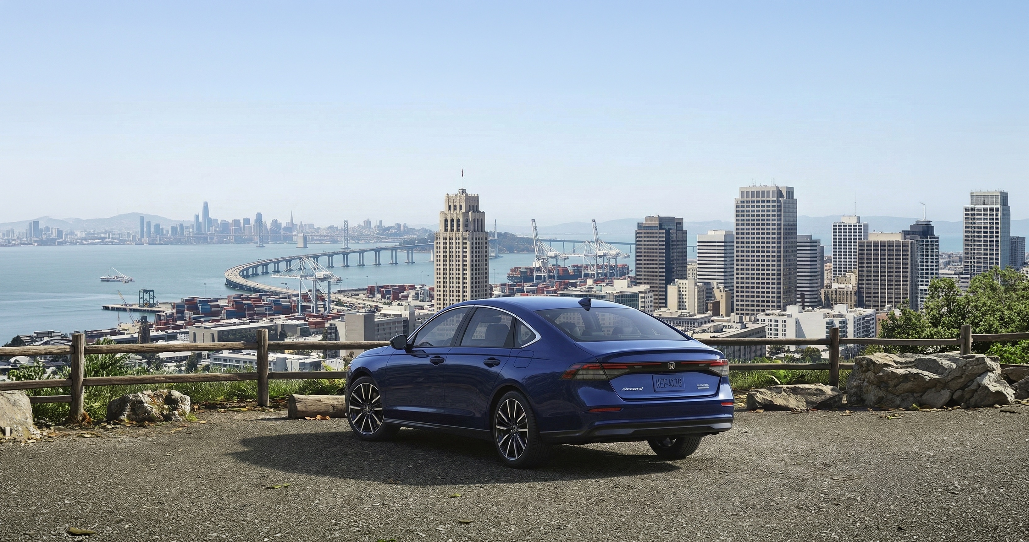 2026 Honda Accord touring hybrid parked overlooking the city of oakland