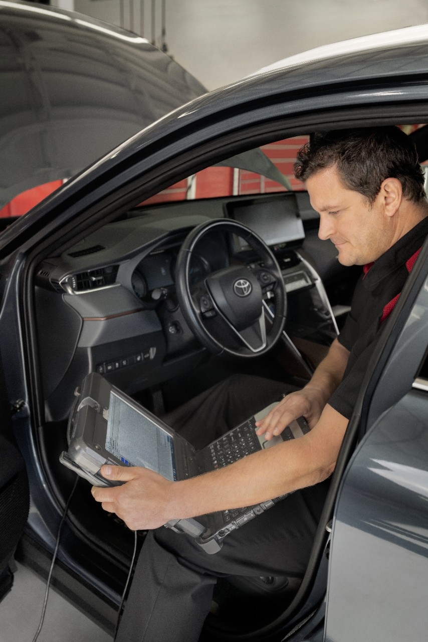 Certified Toyota mechanic preventing costly repairs through routine inspection