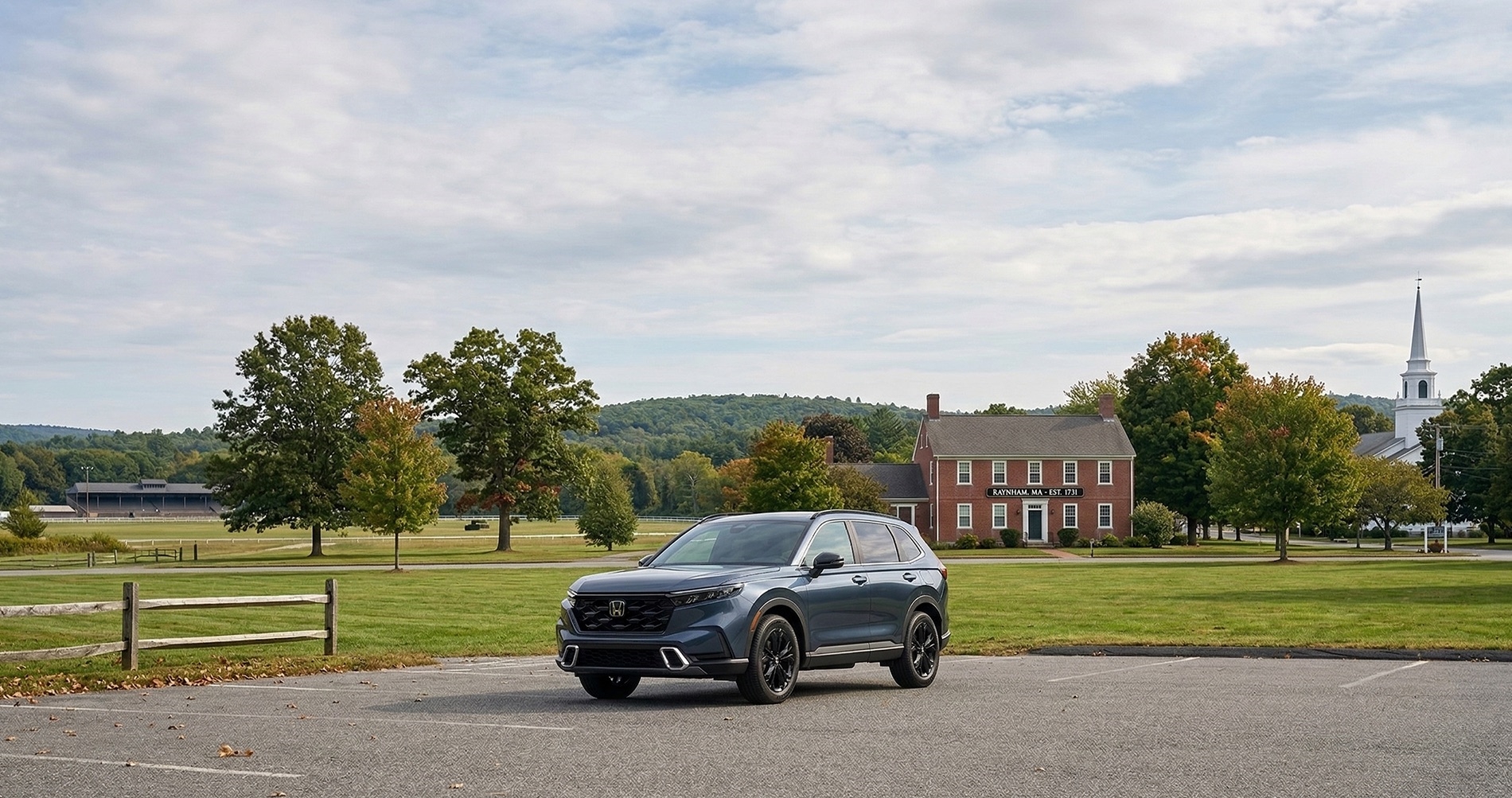 Honda CR-V Hybrid parked near historic building in Raynham Massachusetts